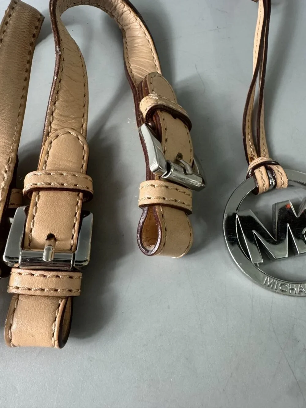 A Bundle of Michael Kors Tan Leather Double Straps w/ Silver-tone MK Logo Charm